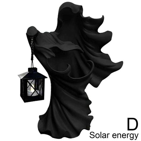 Complete your Halloween Decor with a Witch Figurine carrying a Lantern from Cracker Barrel